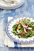 Swiss chard salad with squid and salami