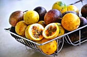 Freshly washed passion fruits in a wire drainer