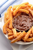 Platter of Churros with Chocolate Dipping Sauce
