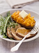 Roast pork with sweet potatoes and beans