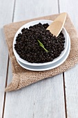 A bowl of black lentils
