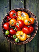 A basket of various tomatoes