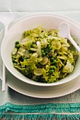 Green salad with fresh peas and grapes