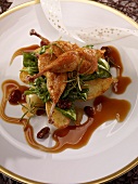 Quail legs with potatoes, baby spinach, currants and sauce