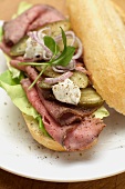 Roast beef, gherkins and remoulade on a baguette