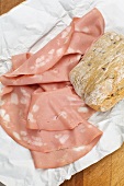 Mortadella and a bread roll