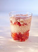 Layered strawberry dessert with redcurrant foam