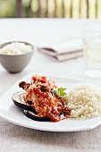 Chicken saltimbocca with grilled aubergines and rice