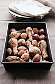 Roast chicken legs with shallots