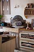 Rustic, stone sink in country-style kitchen