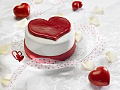 The Word "Love" on Heart Shaped Cake