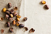 Roasted chestnut peeled and unpeeled (seen from above)