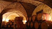 Barrels in a wine cellar at the Skoff winery in Gamlitz, Südsteiermark, Austria