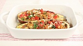 Gratinated aubergine with a vegetable rice filling