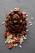 A pine cone and pine nuts