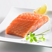 Fresh salmon fillet with parsley and lemon