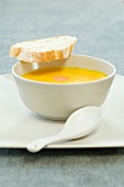 Carrot soup and a slice of bread
