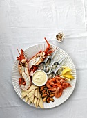 A seafood platter with a dip (seen from above)