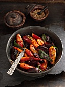 Oven-braised carrots, beetroot and potatoes