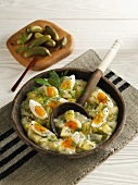 Salad peel potatoes with soft boiled eggs