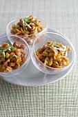 Onion and bacon salsa in glass bowls