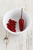 Red chilli peppers, whole and chopped
