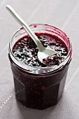 A jar of blackberry and raspberry jam