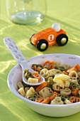 A colourful bowl of pasta (children's meal)