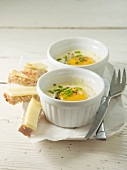 Eggs in ramekins and mouillettes (French bread slices)