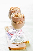 Layered deserts with nougat mousse and biscuit crumbs