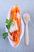 Glazed carrots with feta cheese and slivered almonds