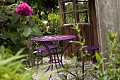 Purple metal garden table and chairs