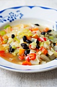 Vegetable stew with peppers, leek and black beans