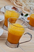 Glasses of carrot soup