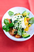 Sweet and sour vegetables with sheep's cheese and basil