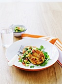 Salmon and sweetcorn fritter with avocado salsa