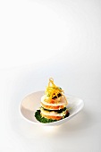 A salmon tower with egg and caviar