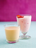 A strawberry smoothie and a peach yogurt drink
