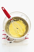 Bearnaise sauce being made in a bain marie