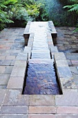 Multilevel pond with slate surround
