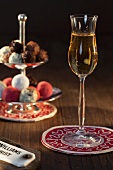 A glass of pear schnapps and a selection of pralines