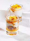 Layered deserts with Mango, yogurt and amarettini
