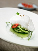 Poached cod fillet on a courgette medley