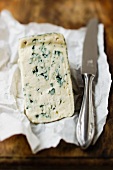 Blue cheese on a piece of cheese paper