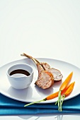 Lamb chops with carrots and a red wine sauce