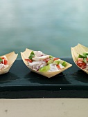 Raw fish salad with vegetables (Asia)