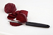 Beetroot with a vegetable knife