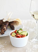 Avocado salsa with grilled kebabs