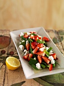Spicy strawberry salad with green beans, mint and feta cheese