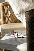 Glasses lying on book